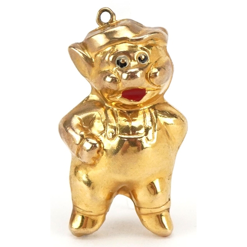 3130 - A 9ct gold and enamel charm in the form of a comical pig, 3cm high, 2.8g.