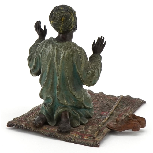 6 - An early 20th century Austrian cold painted bronze of an Arabic man praying by Franz Bergmann, beari... 