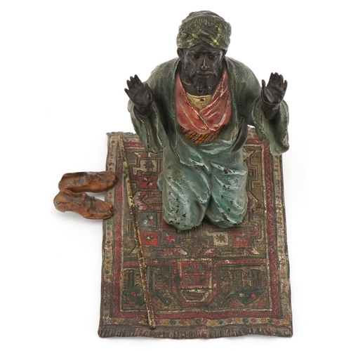 6 - An early 20th century Austrian cold painted bronze of an Arabic man praying by Franz Bergmann, beari... 