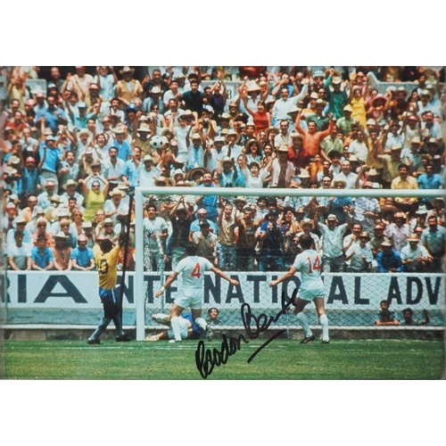 1414 - A Gordon Banks signed colour photograph: The Pelé Save, signed in black ink, within a silvered frame... 