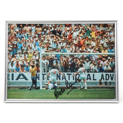 1414 - A Gordon Banks signed colour photograph: The Pelé Save, signed in black ink, within a silvered frame... 