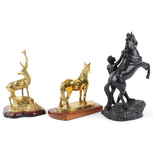 1558 - A late 20th century resin Marley horse figure group, 31cm high, together with a bronze figure of a h... 