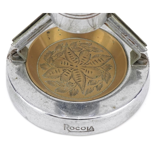 1609 - A mid 20th century Rocola chromium plated Muhlex table lighter and ashtray, 13cm high.