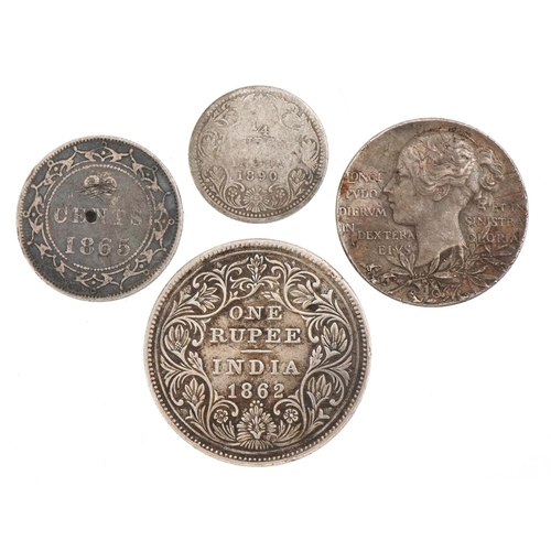 1263 - Victorian silver coins to include an India 1862 one rupee, a Newfoundland 1865 twenty cents, drilled... 