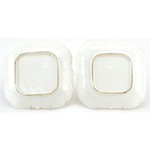 136 - A pair of late 19th/early 20th century French porcelain plates of square form, each with gilt and fl... 