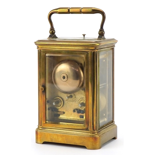 203 - A 20th century gilt brass repeater carriage clock with swing handle, the white enamel dial with blac... 