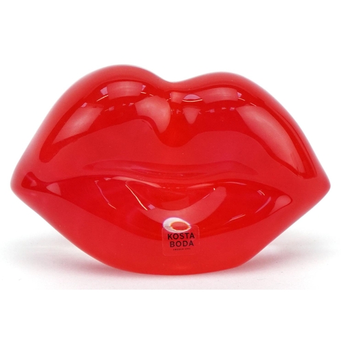 A Kosta Boda glass pair of lips, signed, 11cm wide.