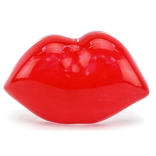 45 - A Kosta Boda glass pair of lips, signed, 11cm wide.