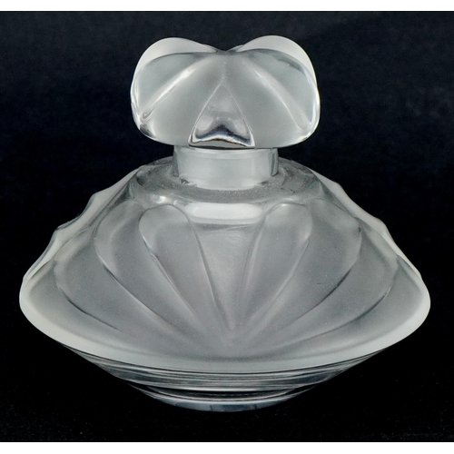 178 - Lalique, a frosted glass scent bottle, etched Lalique France to the base, 7.5cm in diameter.