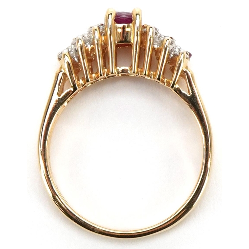 3417 - A 14ct gold ruby and diamond three row dress ring, size M, 3.8g.