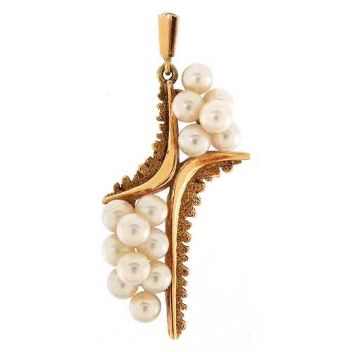 3048 - A Japanese 14ct gold Mikimoto pearl pendant, 4cm high, 4.9g, housed in a Mikimoto Pearl box.