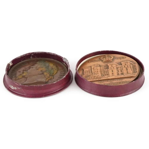 1321 - Two Elizabeth II and Napoleon III commemorative bronze medallions, each 5cm in diameter.