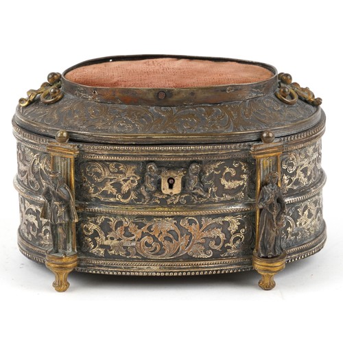 309 - A 19th century French oval gilt metal jewellery casket, the hinged lid revealing a green velvet line... 