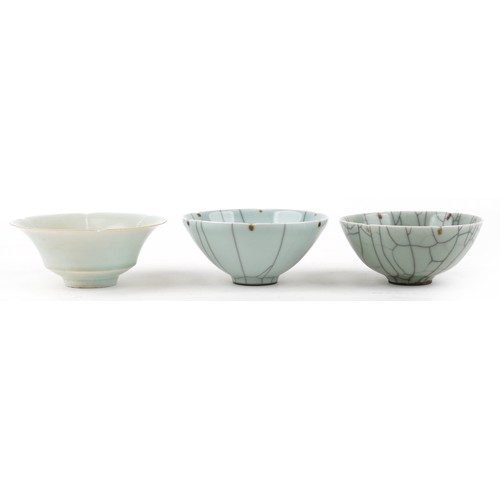 469 - Two similar Chinese green celadon crackle glazed circular bowls, 20th century, signed to bases, 14cm... 