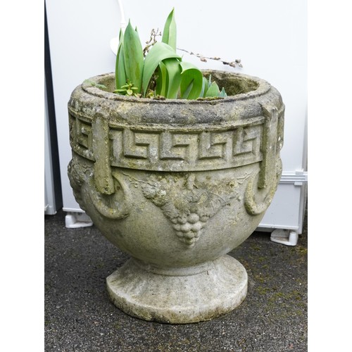 2180 - A 20th century cast composition circular garden planter on a plinth base, 40cm high.