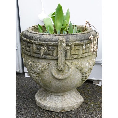 2180 - A 20th century cast composition circular garden planter on a plinth base, 40cm high.