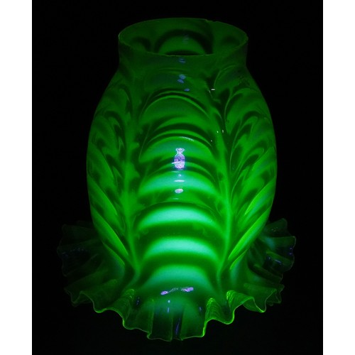 258 - A Victorian Vaseline and uranium glass frilled lampshade, 15.5cm high, the fitting 6.5cm in diameter... 