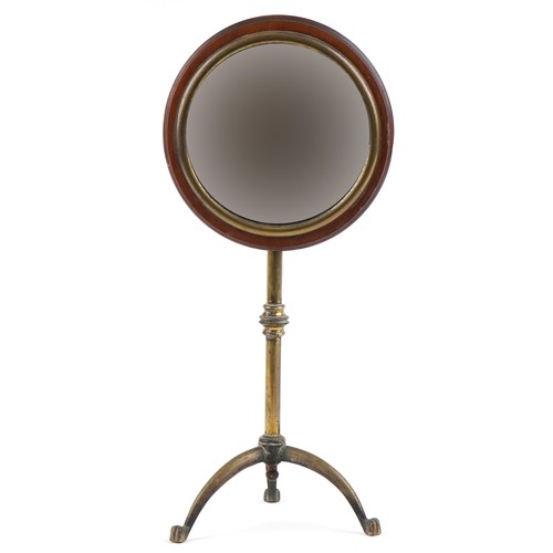 352 - A 19th century adjustable brass shaving mirror, on a tripod base, 50cm not extended