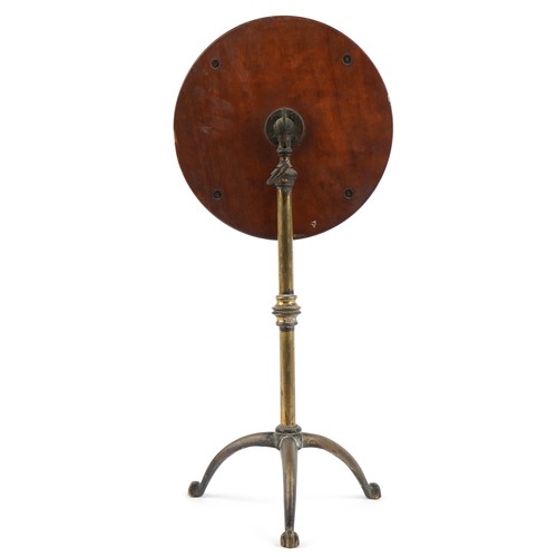 352 - A 19th century adjustable brass shaving mirror, on a tripod base, 50cm not extended