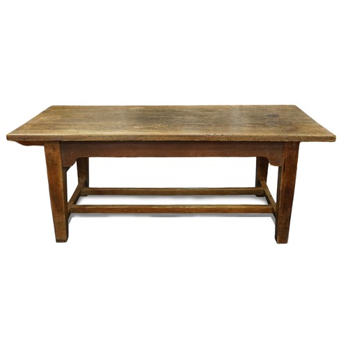 A 19th century oak three plank farmhouse table raised on tapering block legs united by stretchers, 76cm H x 198cm L x 89cm D.