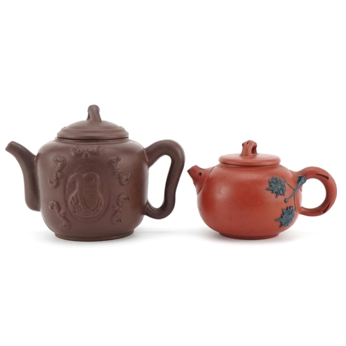 143 - A Chinese Yixing stoneware teapot, 20th century, bearing four character mark to base, 10cm high, tog... 