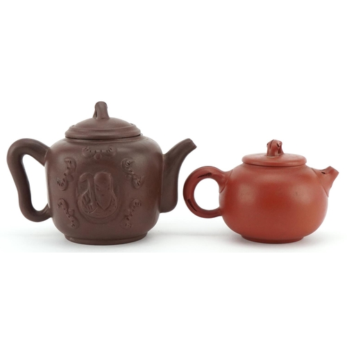 143 - A Chinese Yixing stoneware teapot, 20th century, bearing four character mark to base, 10cm high, tog... 