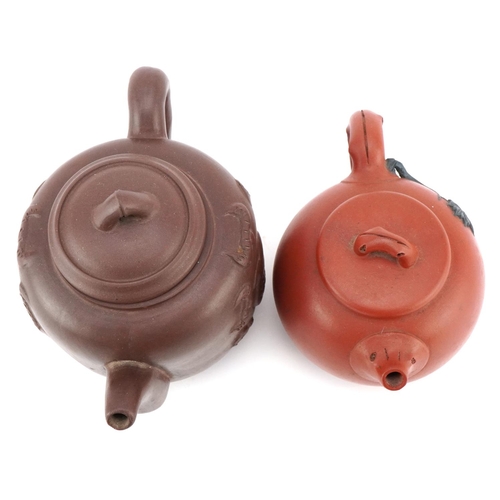 143 - A Chinese Yixing stoneware teapot, 20th century, bearing four character mark to base, 10cm high, tog... 