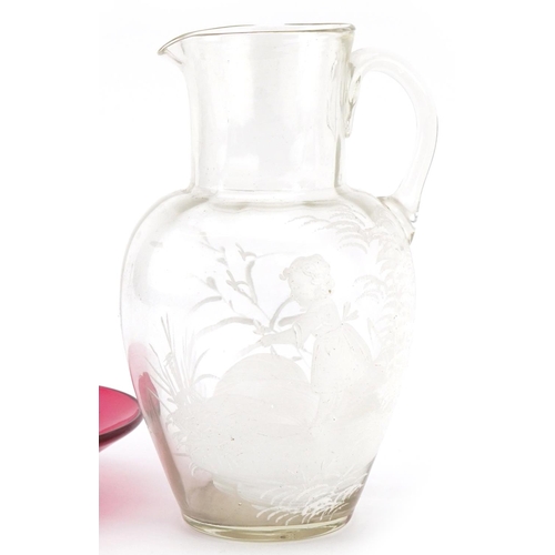 157 - A late Victorian Mary Gregory hand painted clear glass jug decorated with a girl picking flowers, 16... 