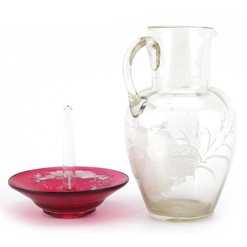 157 - A late Victorian Mary Gregory hand painted clear glass jug decorated with a girl picking flowers, 16... 