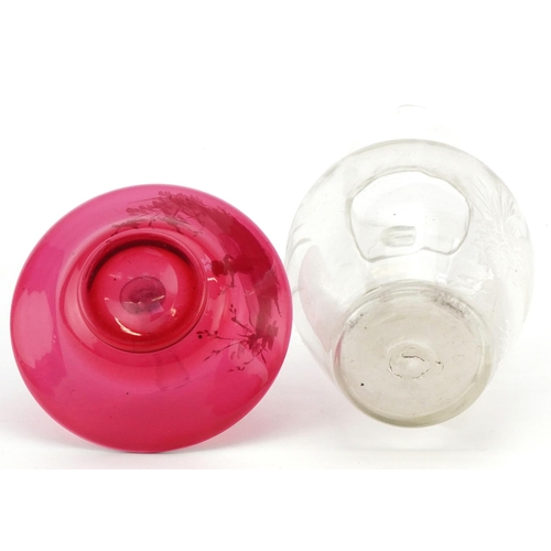 157 - A late Victorian Mary Gregory hand painted clear glass jug decorated with a girl picking flowers, 16... 