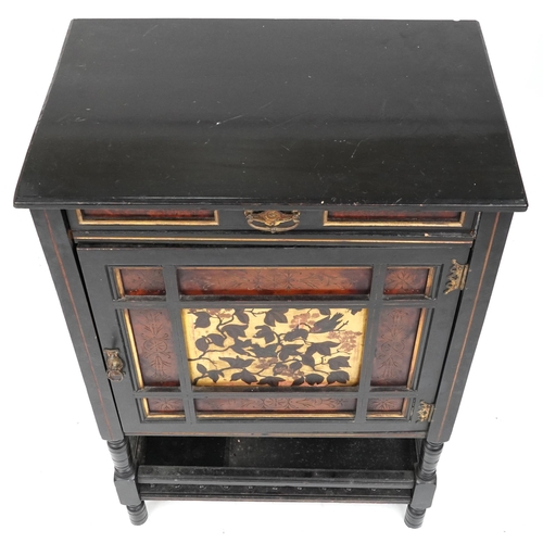  A late 19th century Aesthetic Movement ebonised and burr walnut side cabinet, circa 1880, fitted wit... 