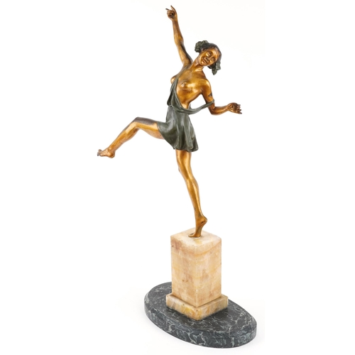 An Art Deco gilt bronze sculpture of a dancing girl raised on a Carrara marble pedestal and oval black marble base, indistinctly signed, 73cm H x 31cm D x 18cm D.