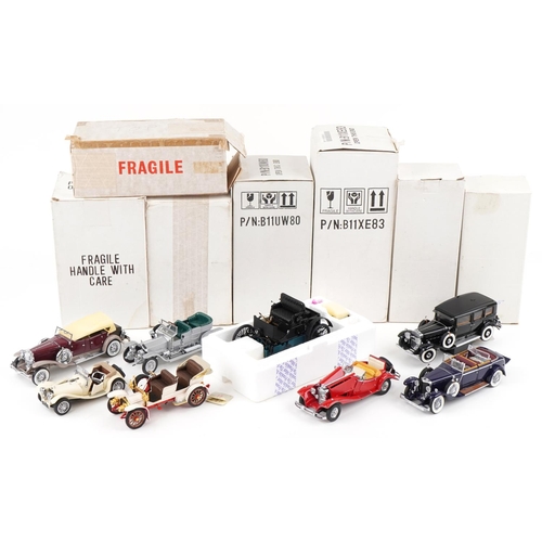 1054 - A collection of predominantly Franklin Mint diecast Precision model vehicles including a 452 Cadilla... 