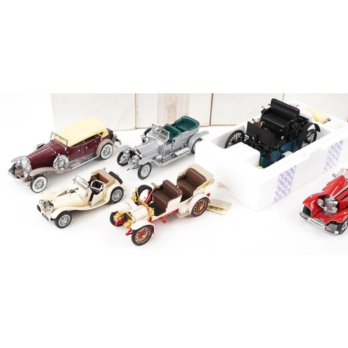 1054 - A collection of predominantly Franklin Mint diecast Precision model vehicles including a 452 Cadilla... 