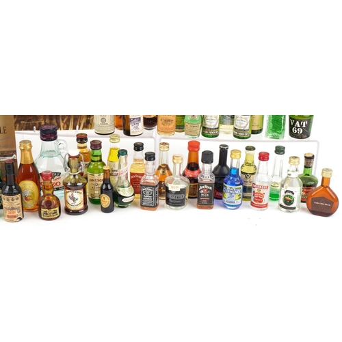 499 - A collection of alcohol miniatures and alcohol related ephemera including Jamieson, 10 Year Old Laph... 