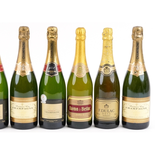 525 - Ten bottles of Champagne including a Baron de Bellac Brut, a Laroche Brut and a Premier Cru Champagn... 
