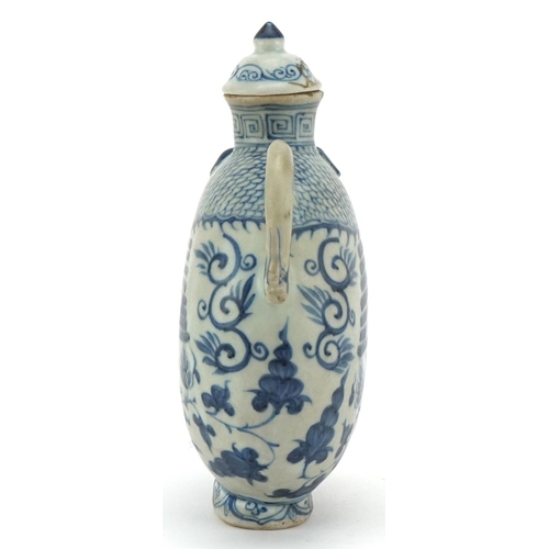 234 - A Chinese porcelain blue and white vessel with cover in the form of a phoenix, 19cm high.
