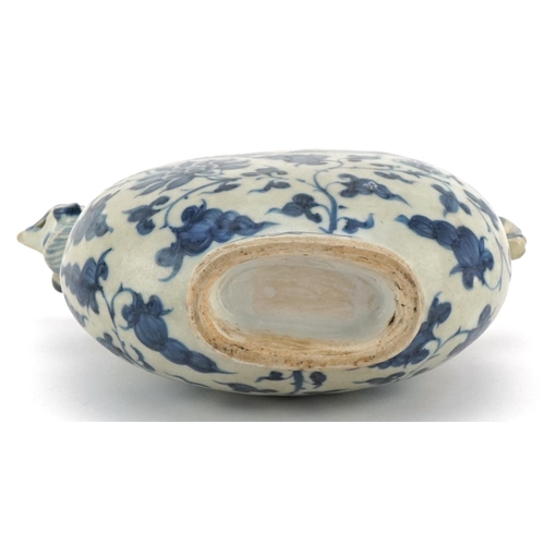 234 - A Chinese porcelain blue and white vessel with cover in the form of a phoenix, 19cm high.