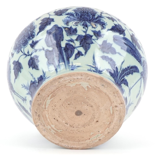 223 - A large Chinese blue and white porcelain vase hand painted with a bird of paradise and foliage, 20th... 