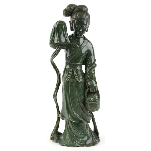 221 - A large Chinese spinach green jade figure of an immortal, 20th century, H-62cm.