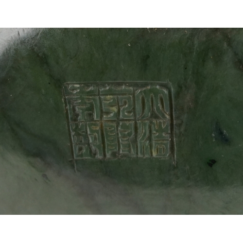 221 - A large Chinese spinach green jade figure of an immortal, 20th century, H-62cm.