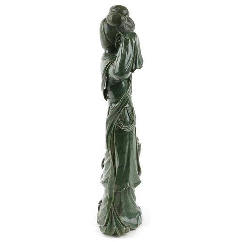 221 - A large Chinese spinach green jade figure of an immortal, 20th century, H-62cm.