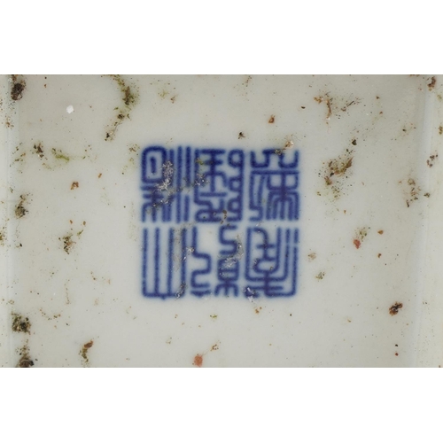 165 - A pair of Chinese porcelain blue and white flat sided vases hand painted with figures amongst mounta... 