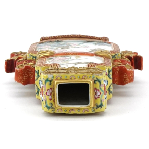 227 - A Chinese Canton porcelain vase with iron red handles finely hand painted in the famille rose palett... 