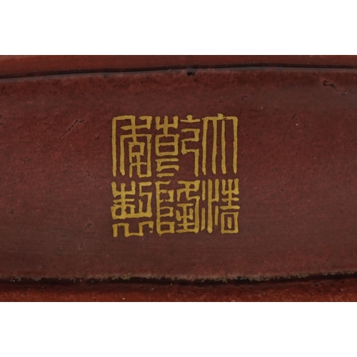 227 - A Chinese Canton porcelain vase with iron red handles finely hand painted in the famille rose palett... 