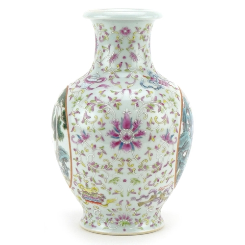 231 - A Chinese porcelain vase hand painted with panels of figures amongst foliage, character marks to the... 
