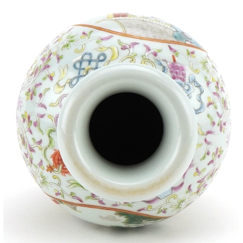 231 - A Chinese porcelain vase hand painted with panels of figures amongst foliage, character marks to the... 