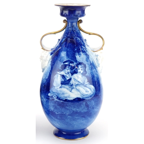 99 - A pair of Royal Doulton Blue Children series ware vases with twin grotesque mask handles, 29.5cm hig... 