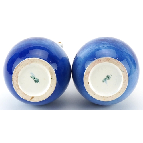 99 - A pair of Royal Doulton Blue Children series ware vases with twin grotesque mask handles, 29.5cm hig... 