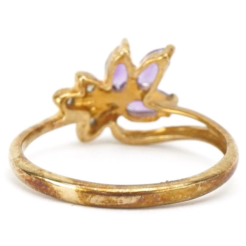 3671 - A 9ct gold amethyst and diamond floral dress ring, size N, 1.9g.